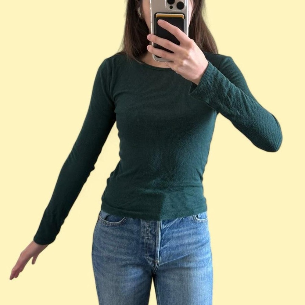 dark green long sleeve top